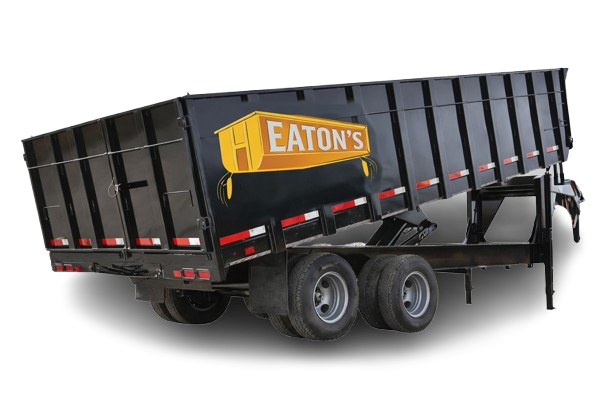 Eaton’s black roll-off dumpster trailer lifted for unloading, heavy-duty waste container for construction and demolition projects.